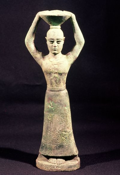 Statuette of an Offering Bearer with a Votive Inscription, from Uruk, Protoliterate Period, 3rd Millennium BC by Mesopotamian